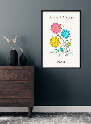 Art print of colorful hand-drawn flowers with "Fleurs et Plantes #2" text, displayed in a modern interior.