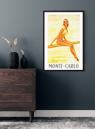 Framed "Young Woman in Monte-Carlo" poster featuring an illustrated woman in a swimsuit, displayed on a dark wall.