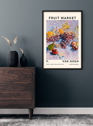 Framed Van Gogh Fruit Market No. 2 poster featuring colorful fruit on a table, displayed above a modern dresser.