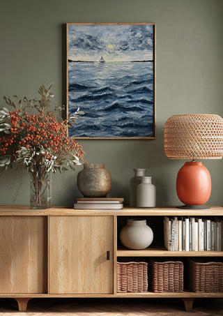 Ocean for my sister by Maya above a wooden sideboard on a sage green wall