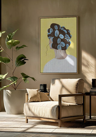 Different solution by Jaron Su framed above a beige armchair beside a potted plant