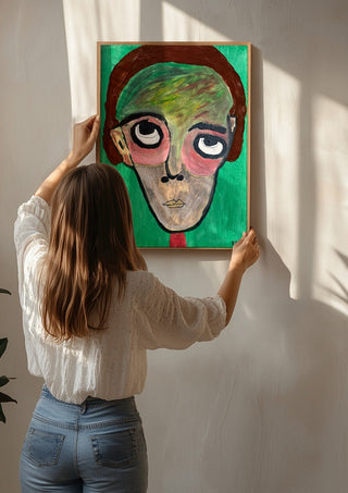 Hjärnspöken by RR being hung on a sunlit wall
