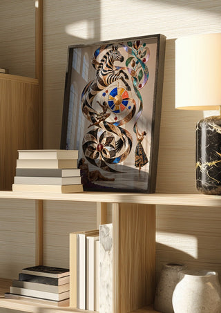 Orbit of the Wild by Haris Delic in a dark frame on a wooden shelf beside books and a lamp