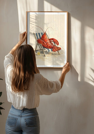The Lobster’s Day Off by Matthews Gallerie being hung on a sunlit wall