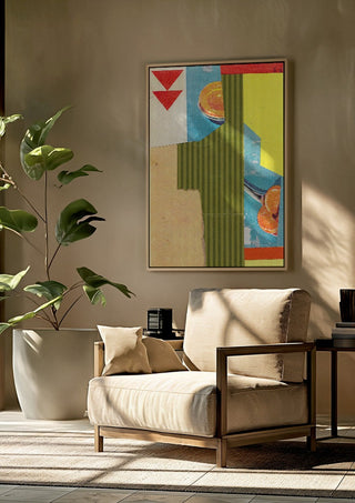 Peach & Mandarin by Kareem Rizk framed above a beige armchair beside a potted plant