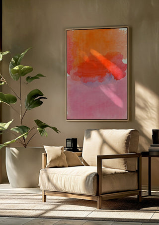 From sunset to sunrise by Ohkimiko framed above a beige armchair beside a potted plant