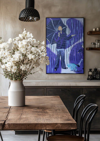 Tanz durch den Regen by Trude in a black frame above a rustic table with white flowers