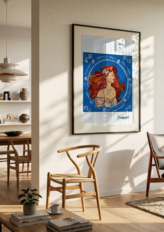 Luna in Blüte by Trude in a black frame in a bright dining room with wooden chairs
