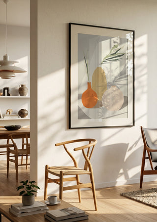 Vases 2 by ThingDesign in a black frame in a bright dining room with wooden chairs