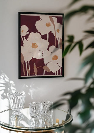 Abstract Flowers 10 by ThingDesign in a black frame above a glass table with crystal glassware