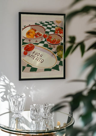 Buon Appetito by ThingDesign in a black frame above a glass table with crystal glassware