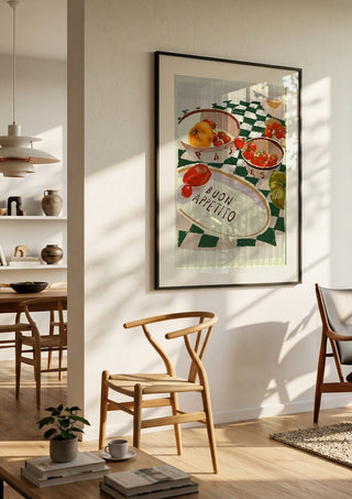 Buon Appetito by ThingDesign in a black frame in a bright dining room with wooden chairs