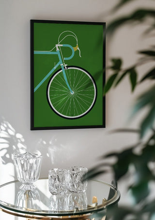 Italian Racing Bike - Detail by Bo Lundberg in a black frame above a glass table with crystal glassware