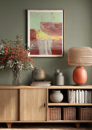 abstract layers and forms 1 by Iris Lehnhardt above a wooden sideboard on a sage green wall