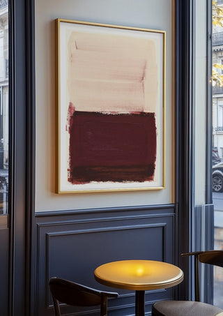 colorfields pale pink warm red by Iris Lehnhardt in an oak frame on a panelled cafe wall