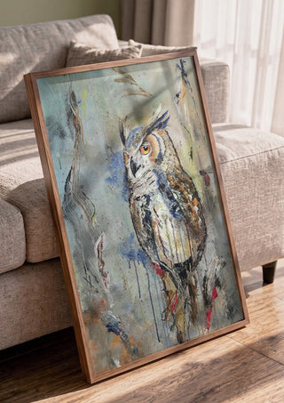 Owl by Lüba in a walnut frame leaning against a grey sofa
