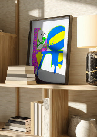 SAVE YOUR LOVE by NKo in a dark frame on a wooden shelf beside books and a lamp