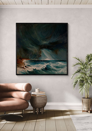 Storm over the Breakers by Justyna Kopania in a black frame above a leather armchair beside a palm