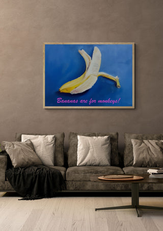 Bananas are for monkeys! by creatievananne in a light oak frame above a grey sofa on a warm brown wall
