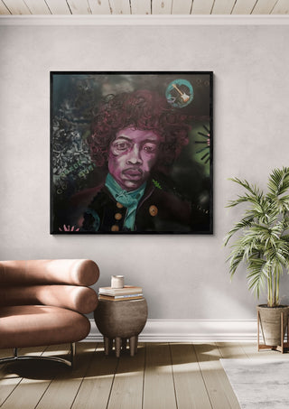 Jimi Hendrix by creatievananne in a black frame above a leather armchair beside a palm