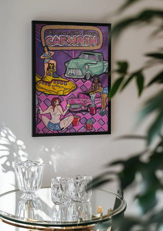 Carwash by KaroGaiaArt in a black frame above a glass table with crystal glassware