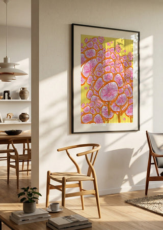 The happy meadow by Creationsbyeditabrus in a black frame in a bright dining room with wooden chairs