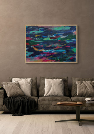 Ripples by Janet Bell in a light oak frame on a warm grey wall above a brown sofa