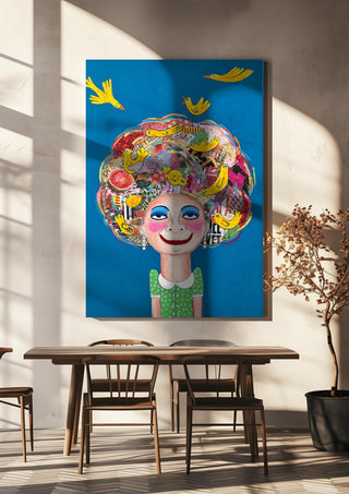 Pájaros en la cabeza by María Burgaz hanging above a wooden dining table in warm sunlight