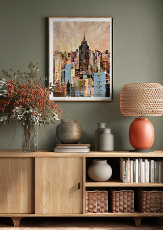 NYC by Art Anne Lee above a wooden sideboard on a sage green wall