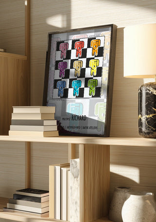 Multiple Richard - Animal Signal by Amadeus Fuchs in a dark frame on a wooden shelf beside books and a lamp