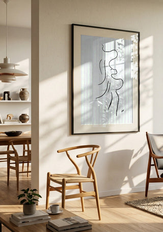I am move by FridaRit in a large black frame in a bright dining room