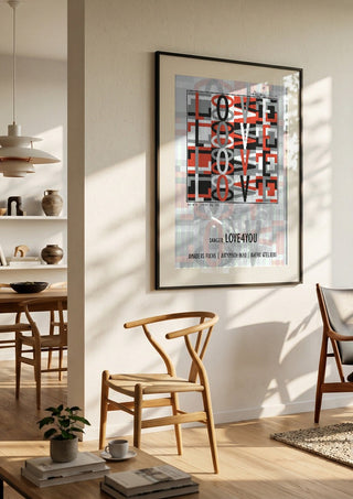 Danger Love4you - Type Signal by Amadeus Fuchs in a black frame in a bright dining room with wooden chairs