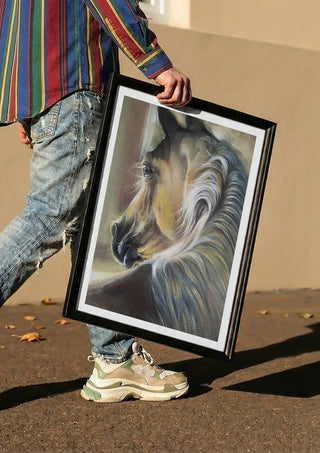Day by Mariia Nikolina carried in a black frame along a sunny street
