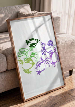 Birds in Green and Purple by Eva Hartman in a walnut frame leaning against a grey sofa