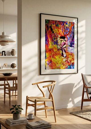 Diana by Carlos Enrique Gozalo Ara in a black frame in a bright dining room with wooden chairs