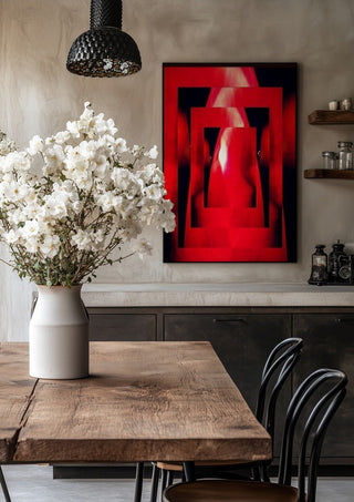 Corazon by Carlos Enrique Gozalo Ara in a black frame above a rustic table with white flowers