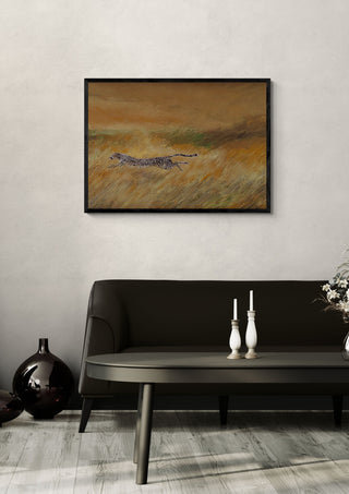 Plus vite que le vent by GAHO in a black frame above a dark sofa with candlesticks
