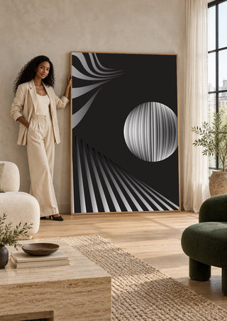 Monochrome II by Aleksi Allan in a tall wooden frame leaning against a wall in a sunlit room