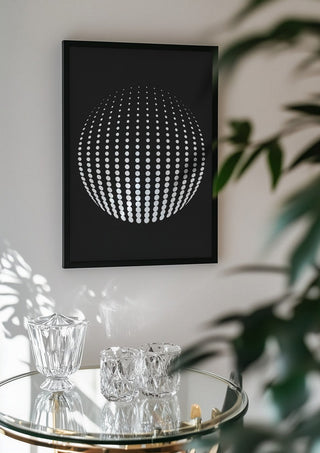 Bubbles by Aleksi Allan in a black frame above a glass table with crystal glassware