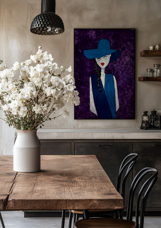 The Midnight Silhouette by Bibi in a black frame above a rustic table with white flowers