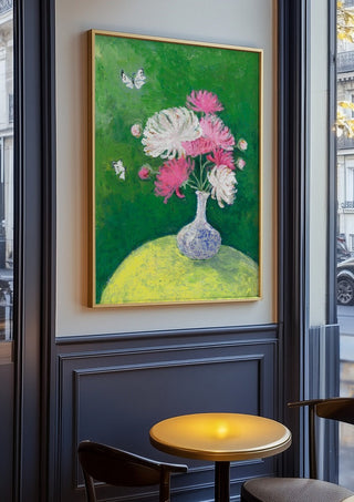 Chrysanthemums by Deblina Dey in an oak frame on a panelled cafe wall