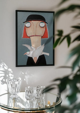 Malwines Strickmöwe by lacaluna in a black frame above a glass table with crystal glassware