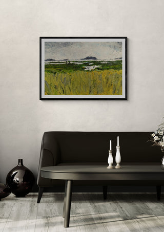 Marais by GAHO in a black frame above a dark sofa with white candlesticks