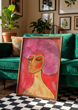 woman with a birthmark by Ian Frederick Harris in a wooden frame beside a green velvet sofa on a chequered floor
