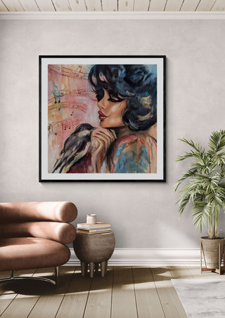 Sound of Hope by Elisa Kay framed above a tan armchair beside a potted plant