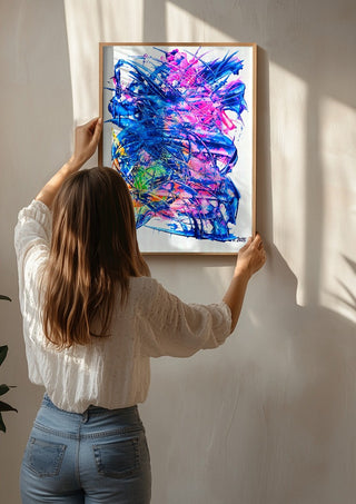 Electric Bloom by Ronald Rumell being hung on a sunlit wall