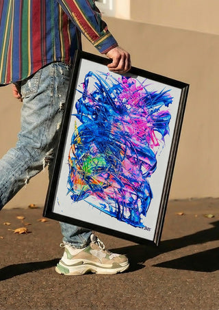 Electric Bloom by Ronald Rumell carried in a black frame along a sunny street