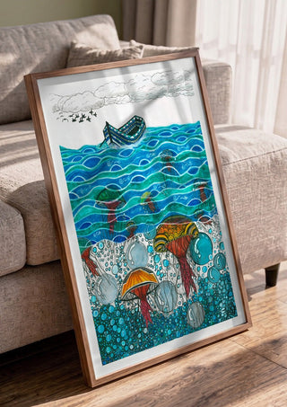 Jellyfish Sea by JHN.ByHjort in a walnut frame leaning against a grey sofa