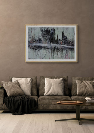 City Reflections by luco art in an oak frame above a grey sofa with cushions
