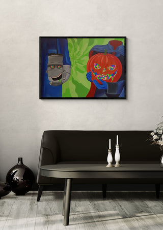 Split Identity by Luigi Monti in a black frame above a dark sofa with white candlesticks